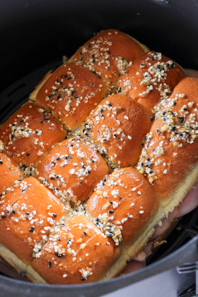 air fryer ham and cheese sliders in the air fryer basket