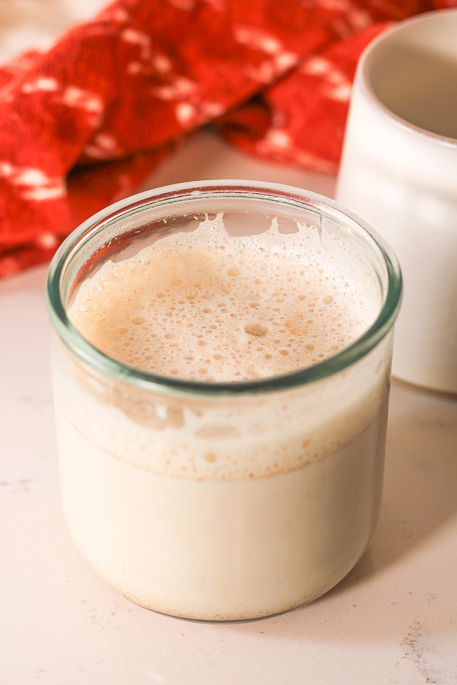 warm milk steamed and frothed with honey and cinnamon to make a cinnamon honey latte