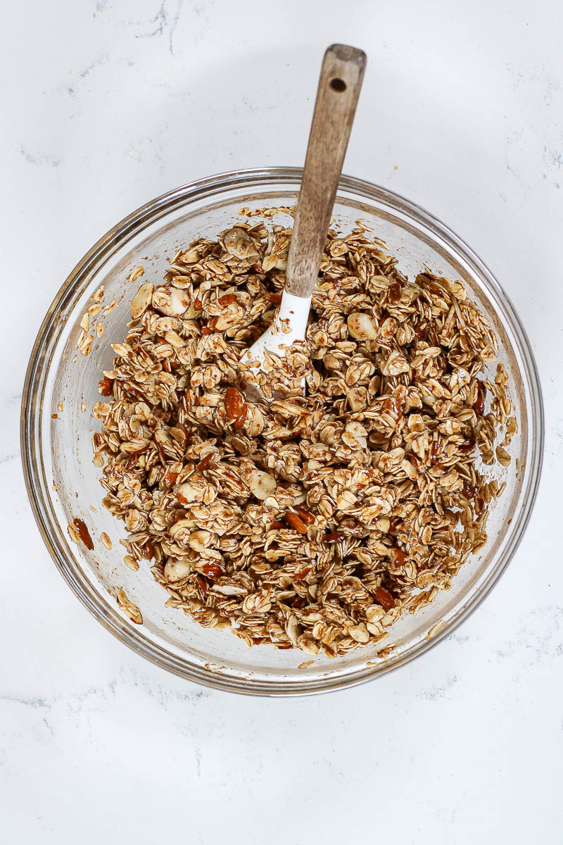 vanilla almond granola ingredients stirred together