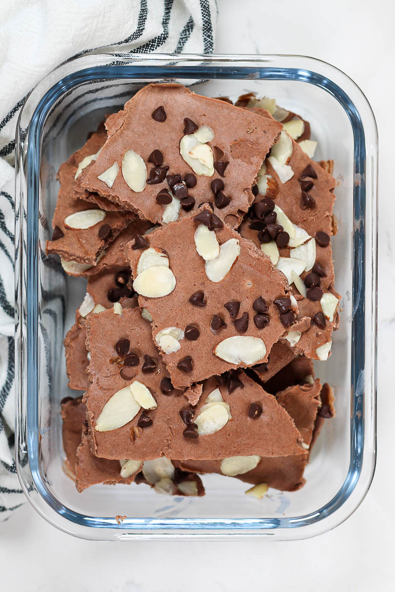 chocolate yogurt bark in a glass container