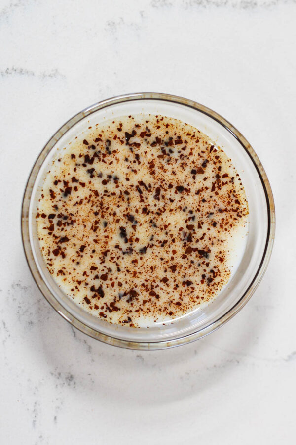 adding instant coffee to milk for coffee chia pudding