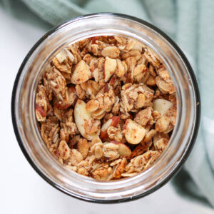 looking down into a jar of vanilla almond granola