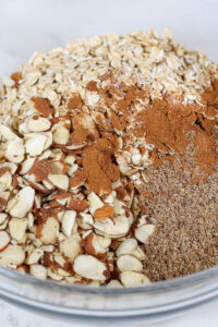 vanilla almond granola dry ingredients in a bowl