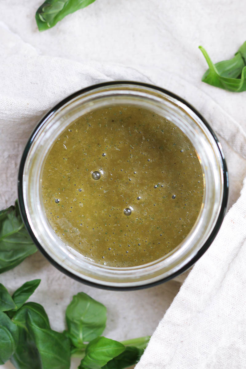 basil balsamic dressing in a glass jar