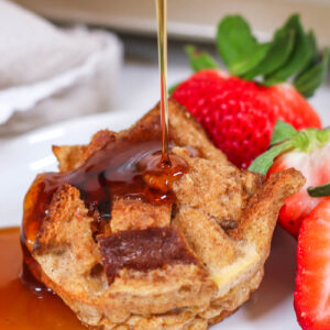 pouring maple syrup on french toast muffins