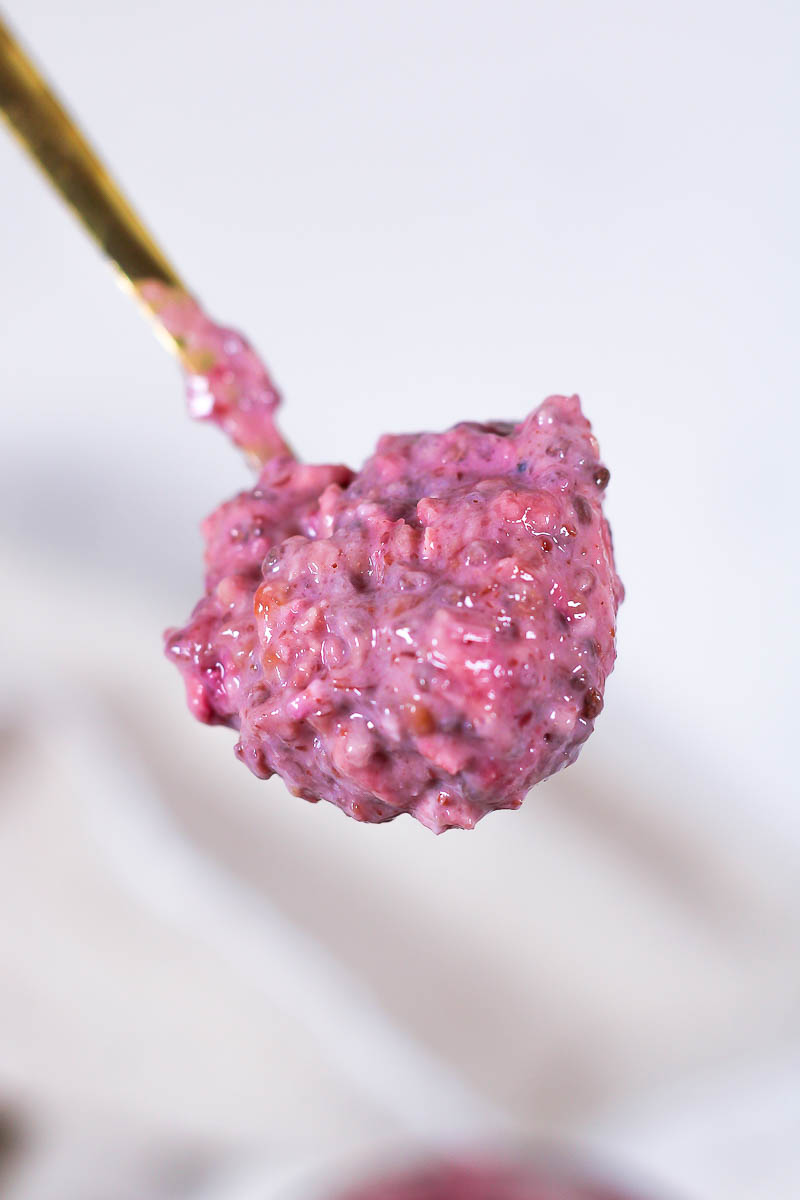 a spoonful of raspberry overnight oats