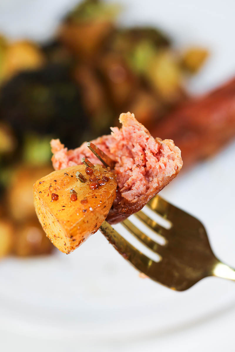 a forkful of honey mustard sausages