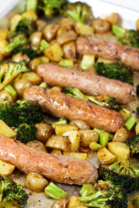 adding sauce halfway through roasting sheet pan honey mustard sausages