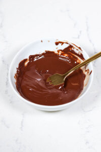 melting chocolate to drizzle over medjool dates