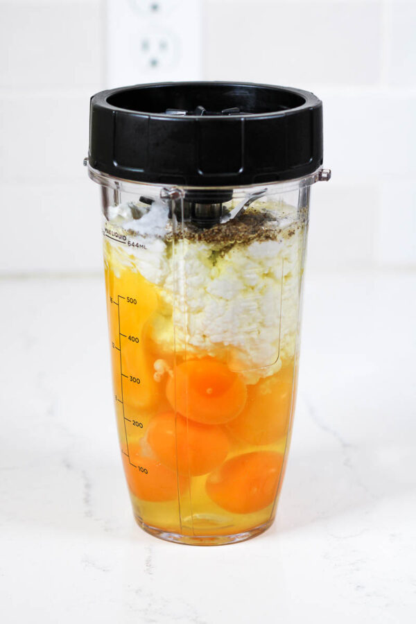 ingredients in the blender for spinach feta egg bites