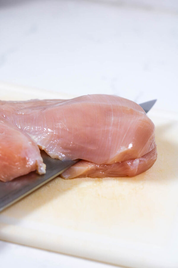 thinly slicing a chicken breast