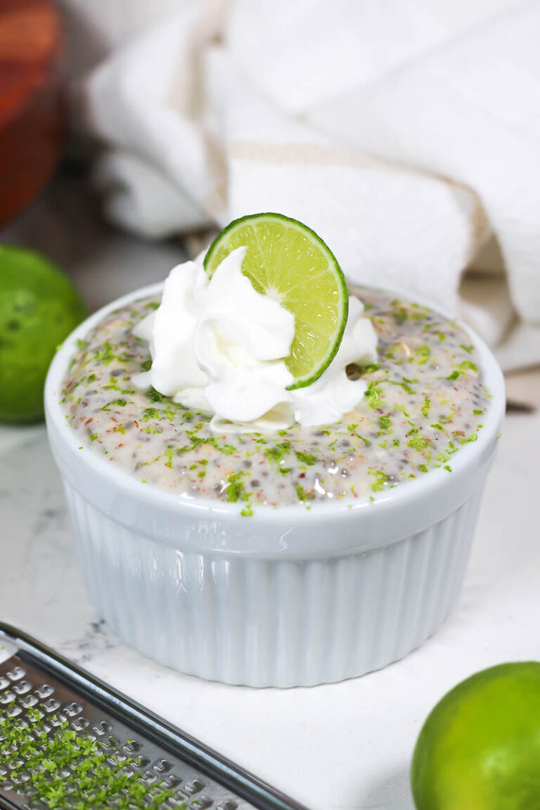 a white ceramic ramekin of key lime pie overnight oats