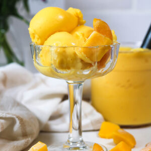 fancy glass of peach mango sorbet