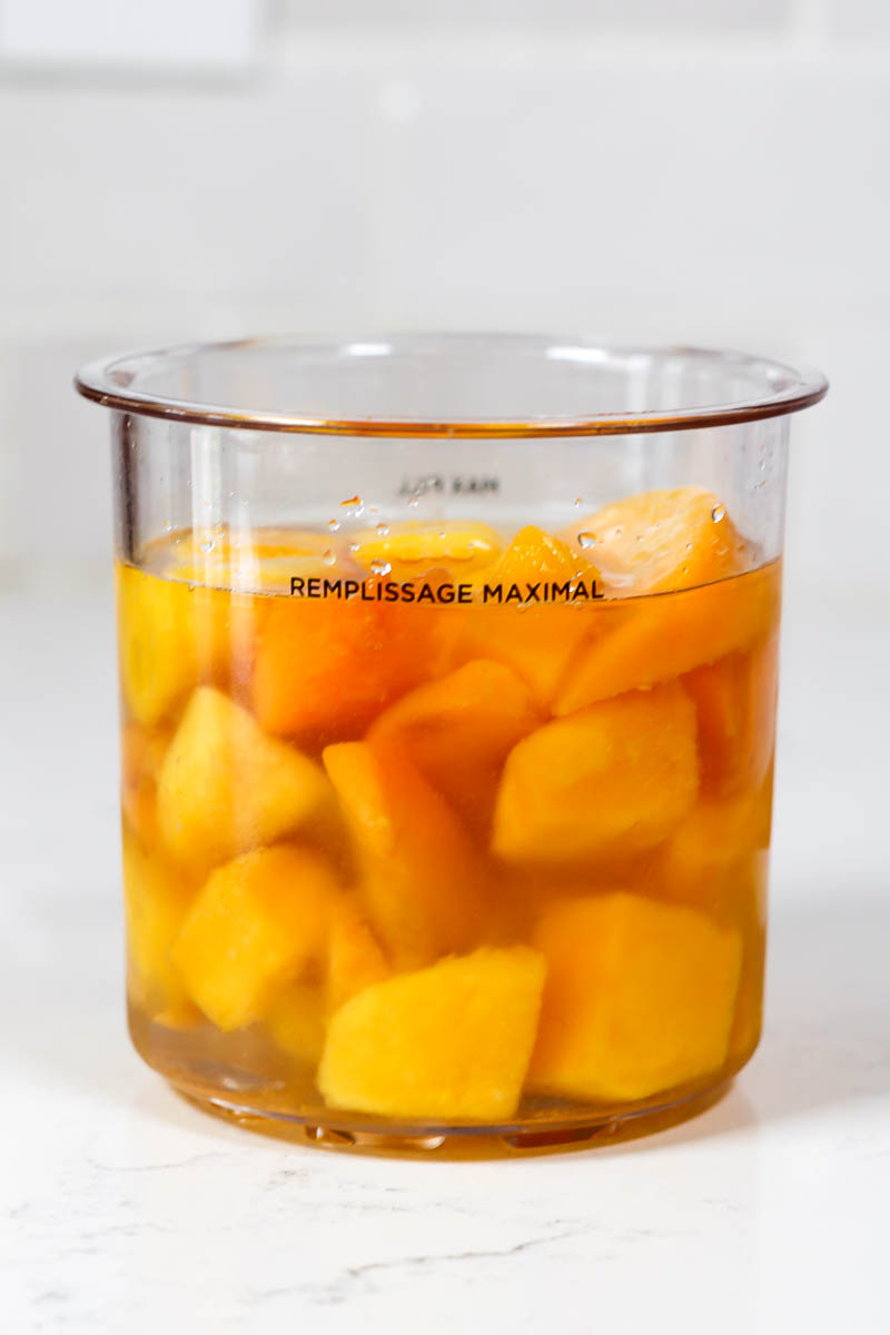 ingredients for mango peach sorbet in a ninja creami pint