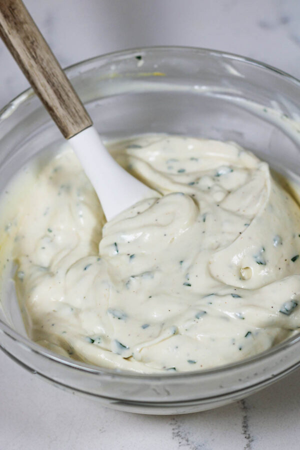 a bowl of healthier, higher protein creamy dressing for chicken macaroni pasta salad