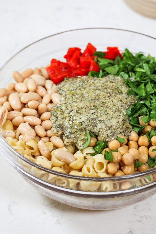 making a bean pasta salad with lemon parmesan vinaigrette