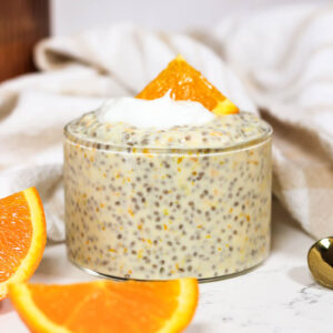 a glass cup of creamsicle orange chia pudding