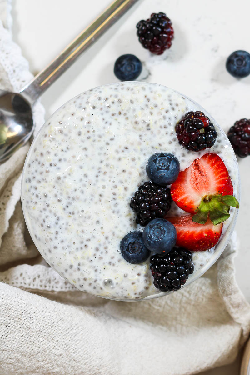 a bowl of quinoa chia pudding topped with berries