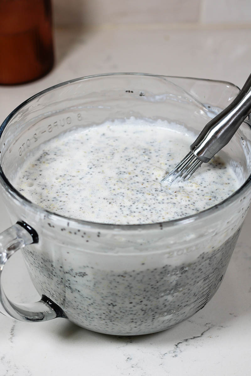 stirring together ingredients for quinoa chia pudding