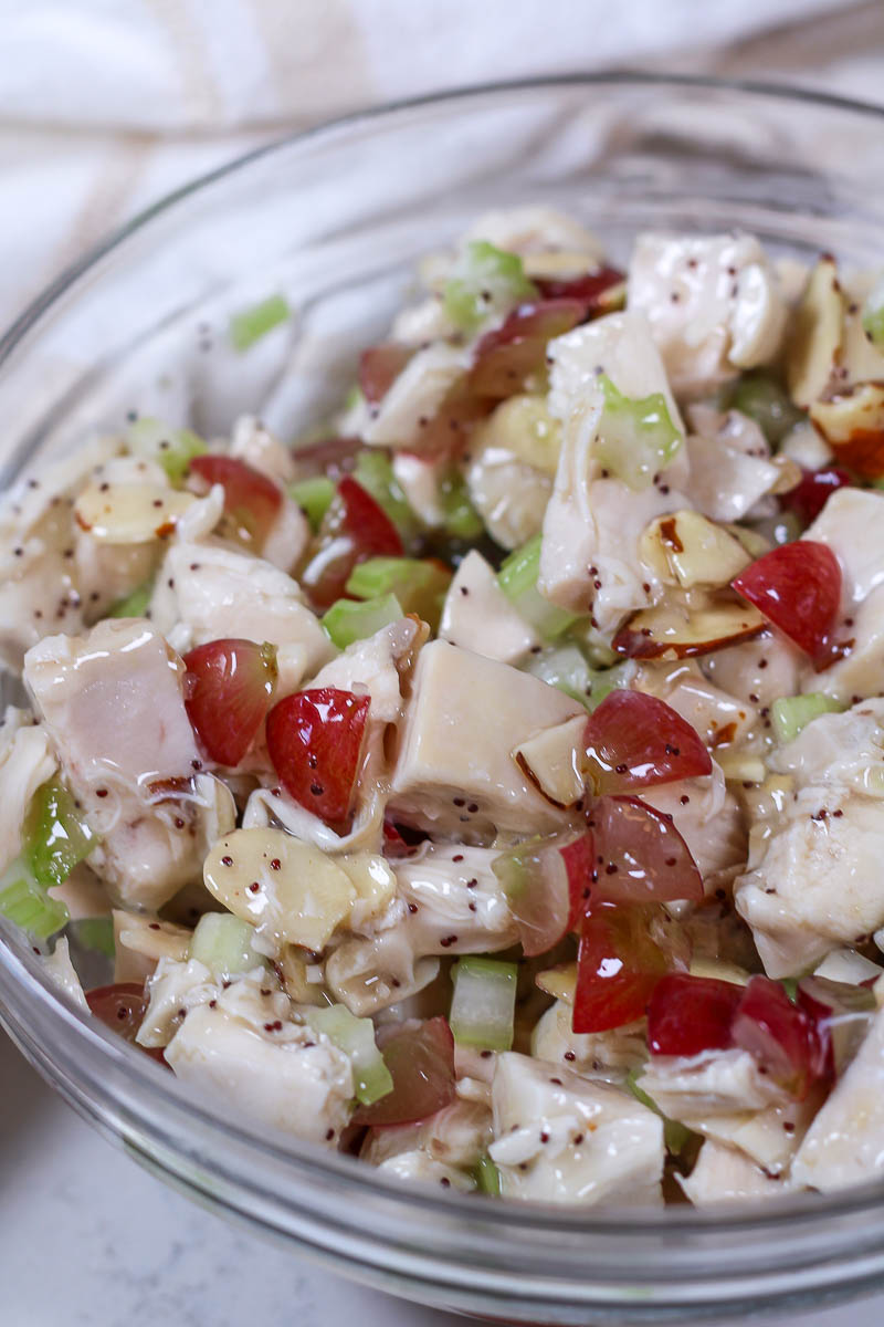 poppy seed chicken salad in a glass bowl