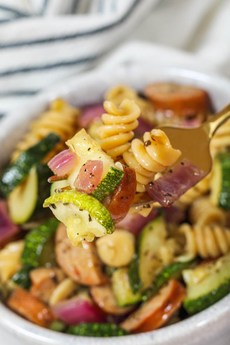 a forkful of zucchini pasta salad