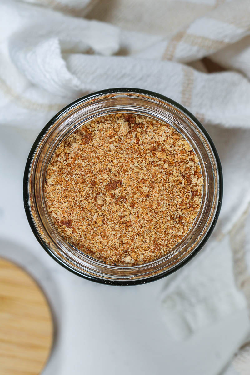 a glass jar of homemade whole wheat bread crumbs