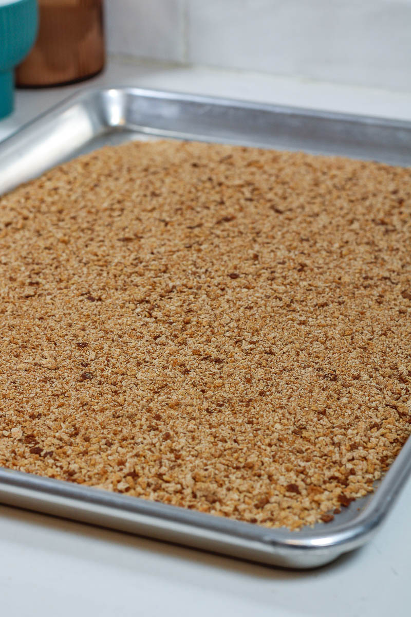 whole wheat bread crumbs cooling on a pan