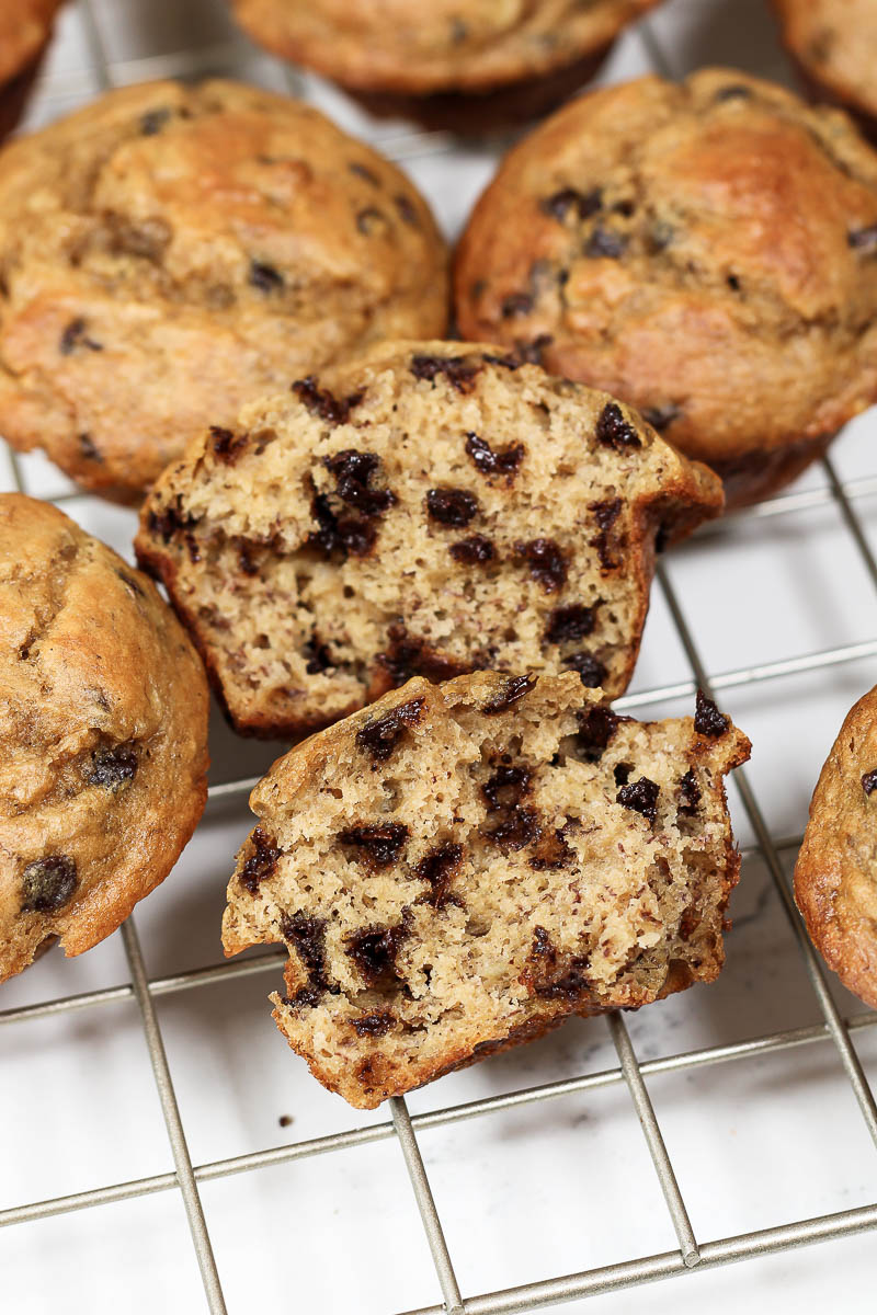 a chocolate chip greek yogurt banana muffin in two halves