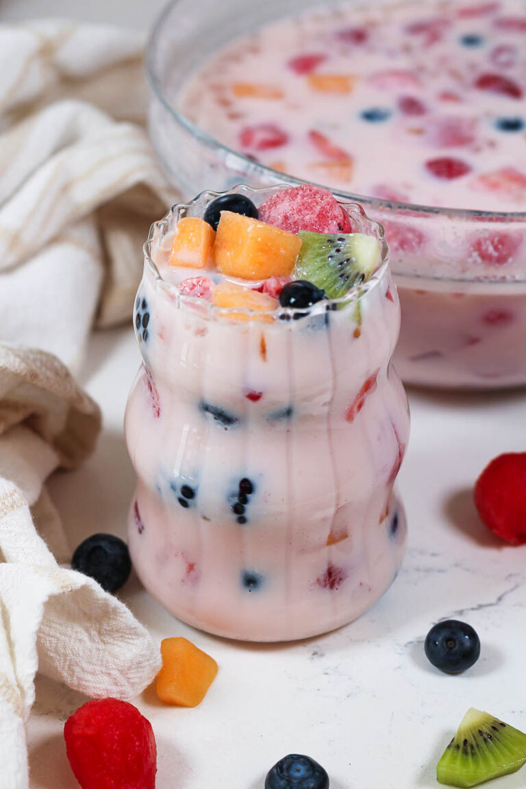 a glass of hwachae with fruit