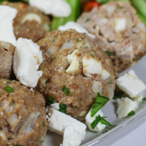 turkey feta meatballs with more crumbled feta