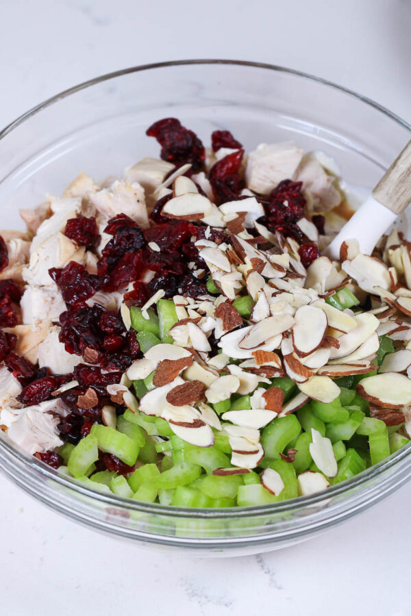 ingredients in a bowl to make cranberry chicken salad