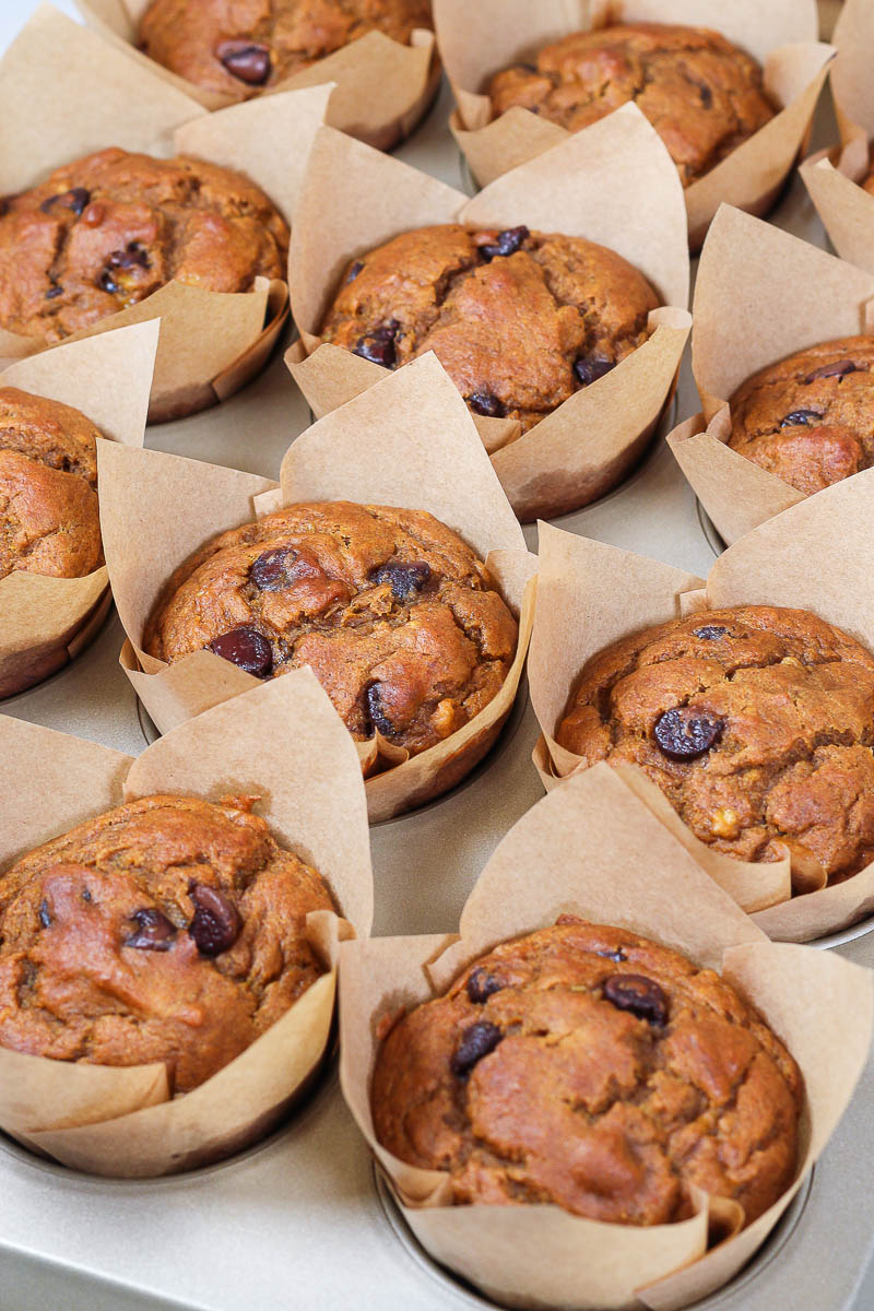 pumpkin banana bread muffins in parchment paper liners