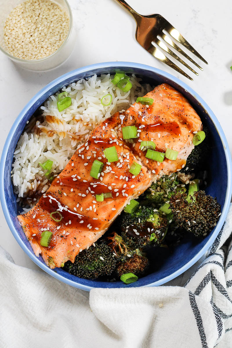 teriyaki salmon bowls in a blue bowl