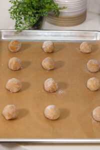 peanut butter cup cookies rolled in sugar before baking
