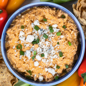 blue bowl of buffalo chicken dip with cottage cheese