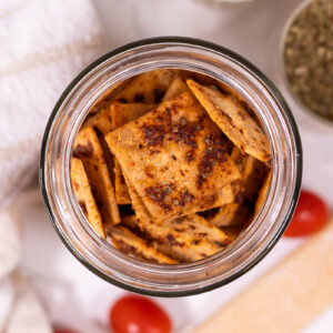 overhead view of jar of seasoned pizza crackers