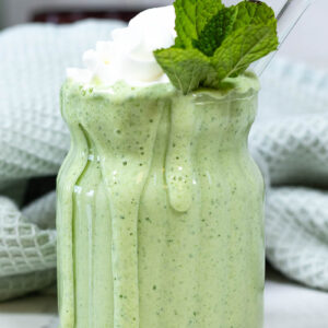 healthy, high protein, copycat shamrock shake dupe with whipped cream