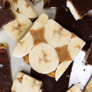 pieces of frozen banana bark with peanut butter and chocolate
