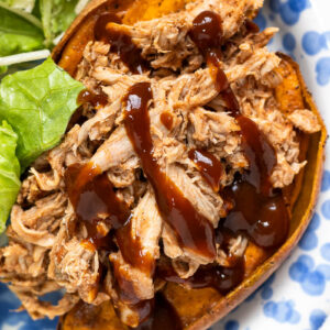 slow cooker pulled pork tenderloin on a plate