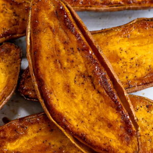 baked sweet potato halves with caramelized edges