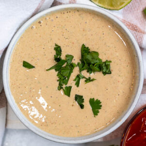 creamy salsa salad dressing topped with cilantro